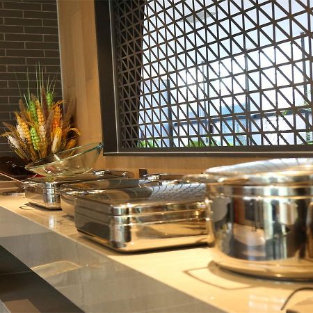 Qiu Guo Hotel Hua Mao Csaojang Kültér fotó