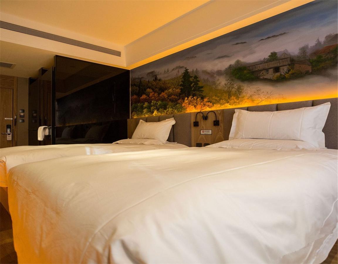 Qiu Guo Hotel Hua Mao Csaojang Kültér fotó